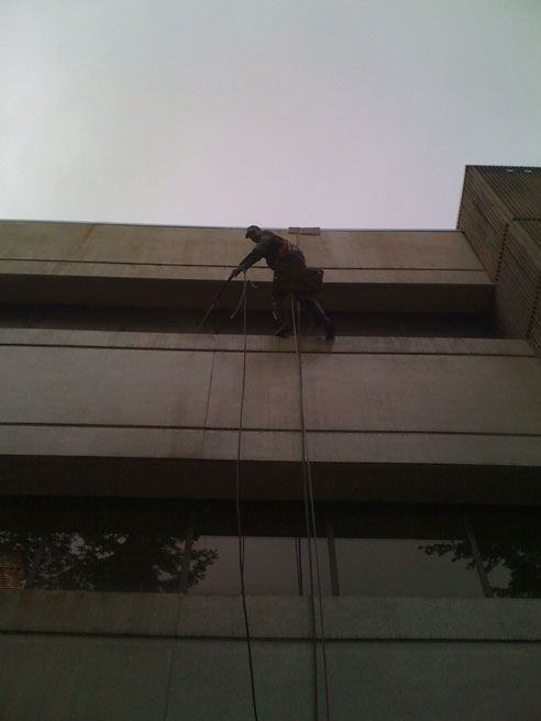 cleaning the outside of the commercial building